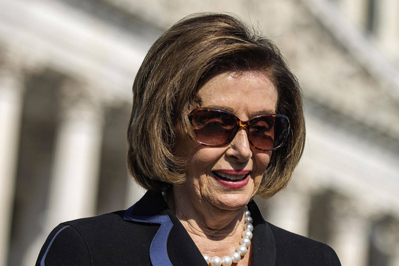 Nancy Pelosi Black Dress Sunglasses Background