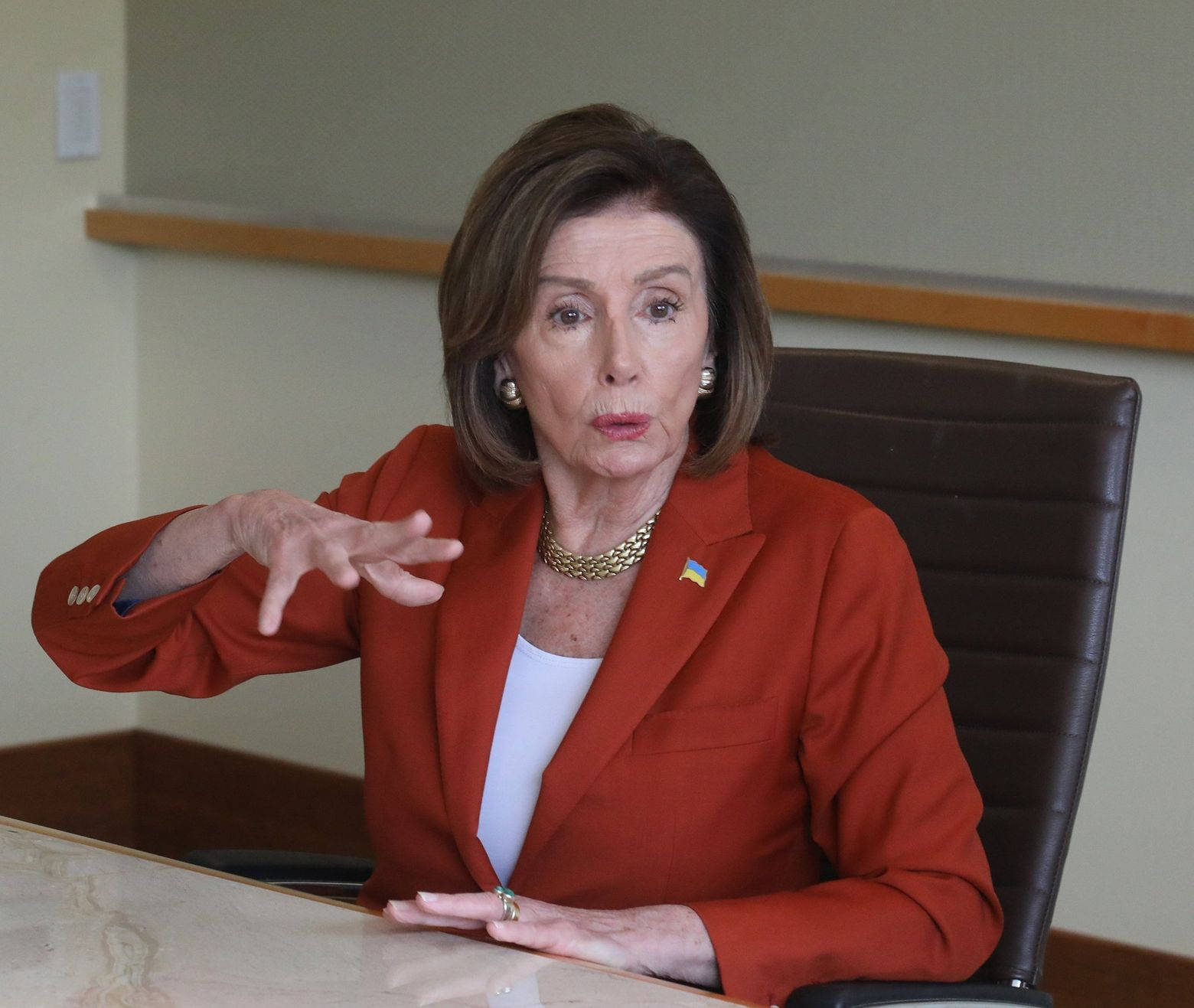 Nancy Pelosi Hand Gesture Background