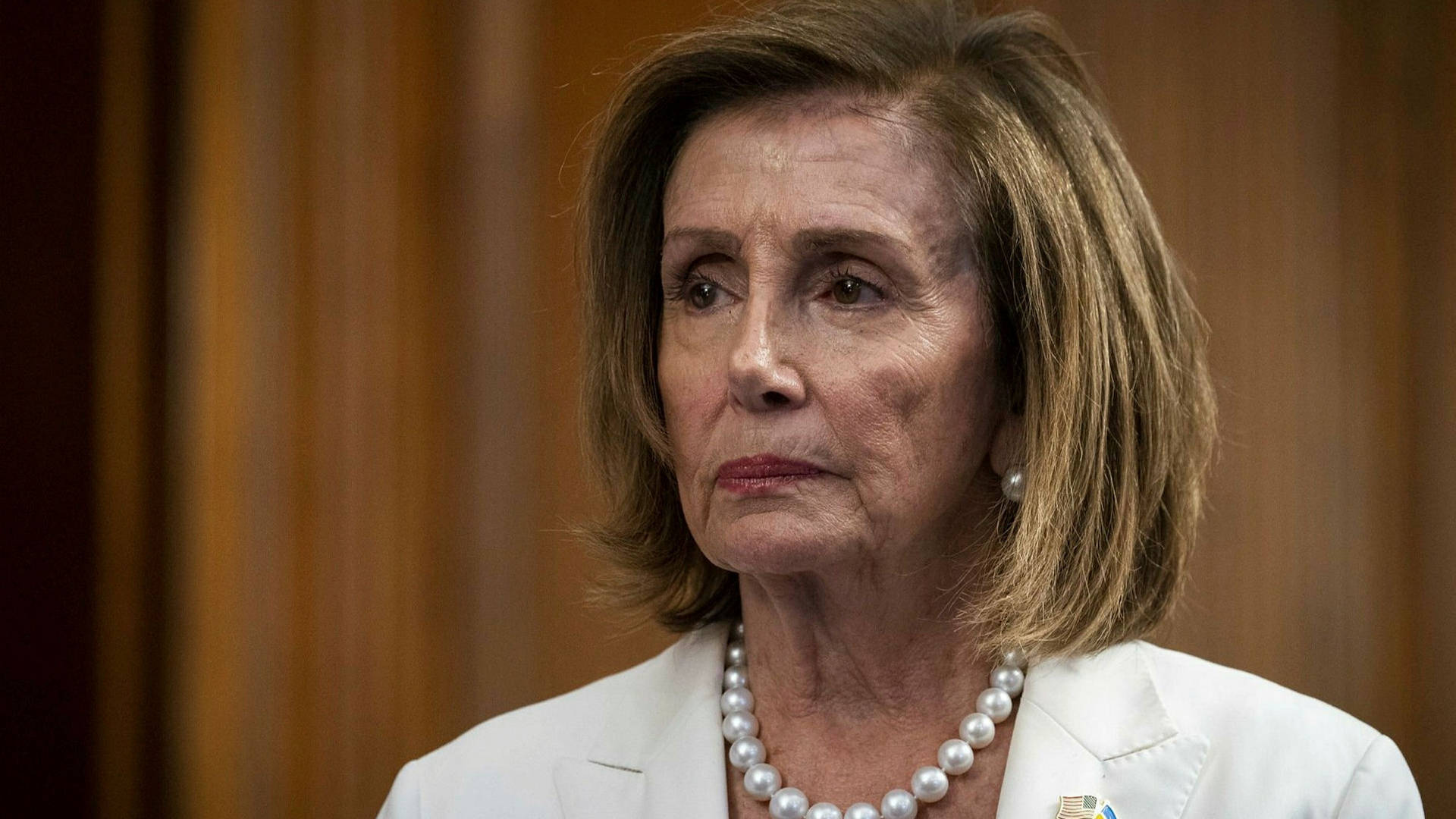 Nancy Pelosi Looking Sad Background