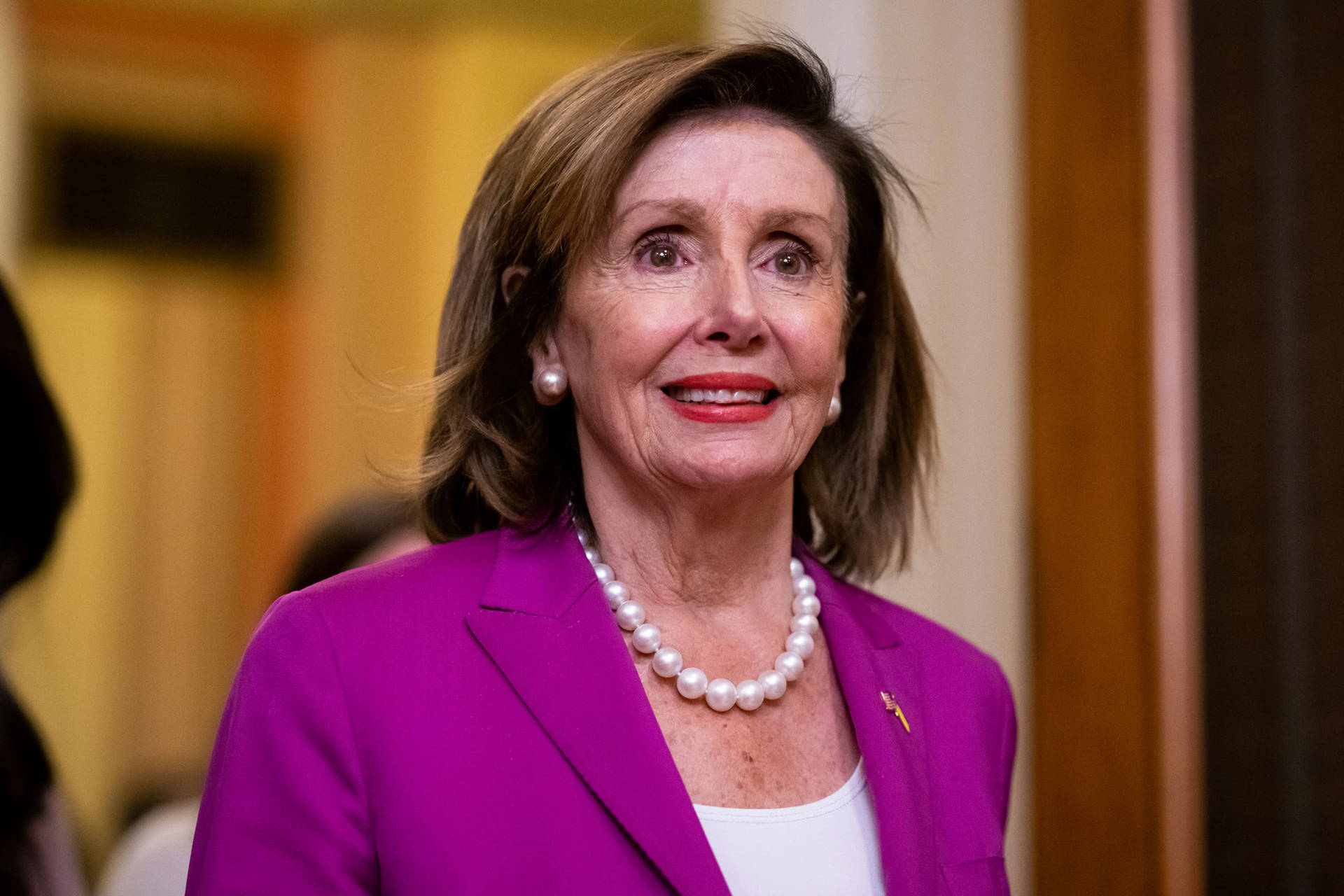 Nancy Pelosi Pearl Necklace Background