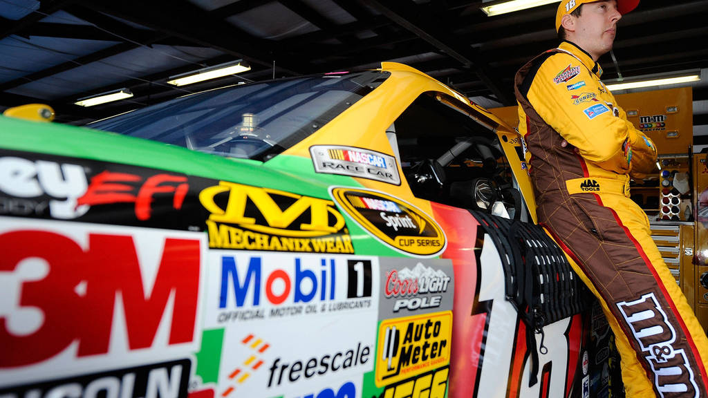 Nascar Driver Kyle Busch Deep In Thought Background