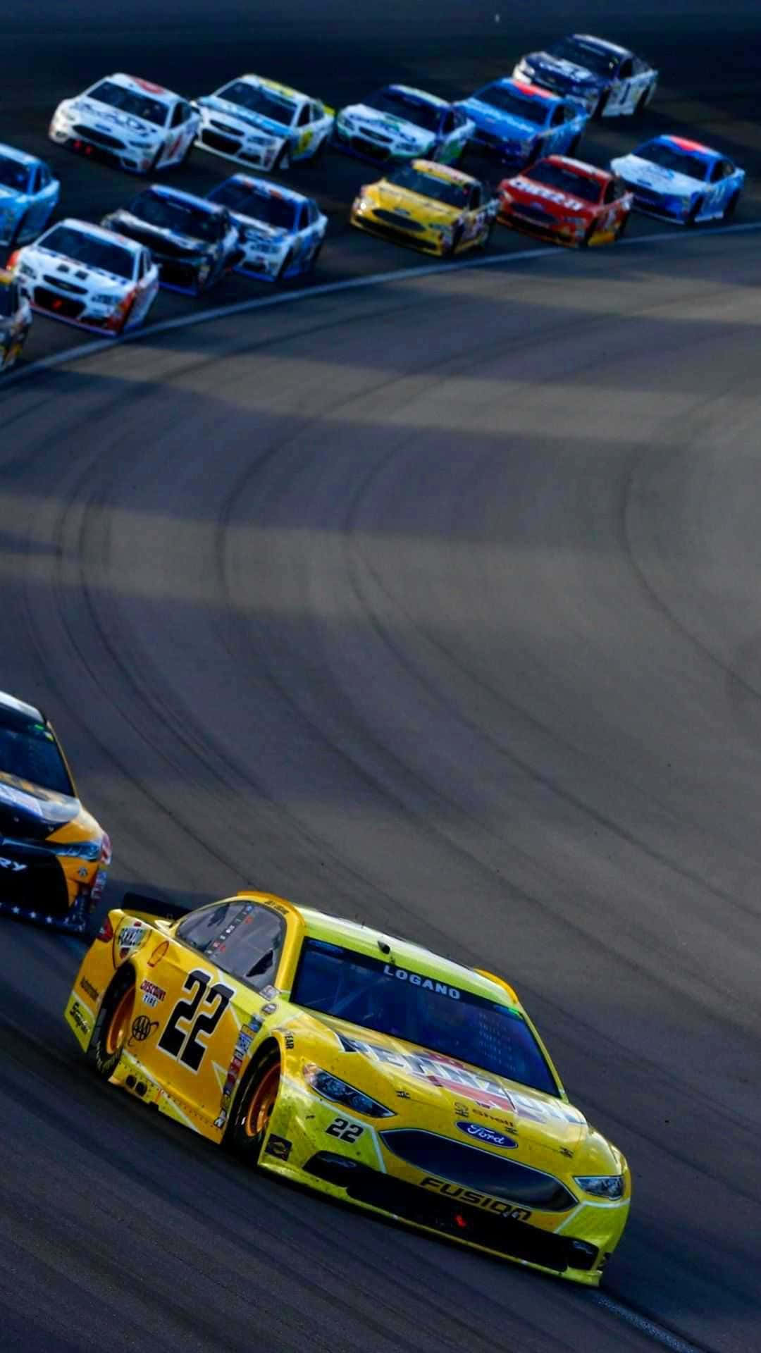 Nascar Drivers Racing On A Track Background