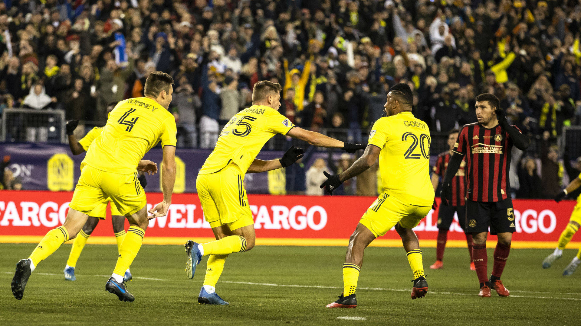 Nashville Sc Players In The Field Background