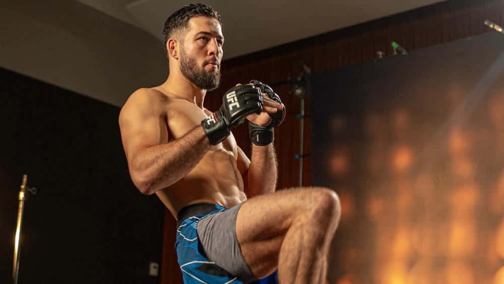 Nassourdine Imavov Posing For Photoshoot Background