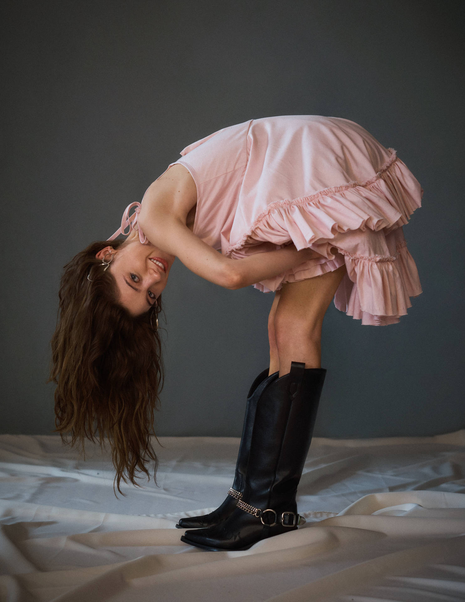 Natalia Dyer Bending Pose Background