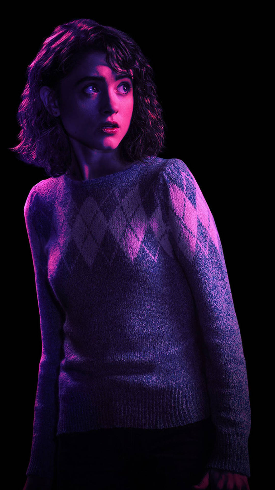 Natalia Dyer In A Dark Scene Background