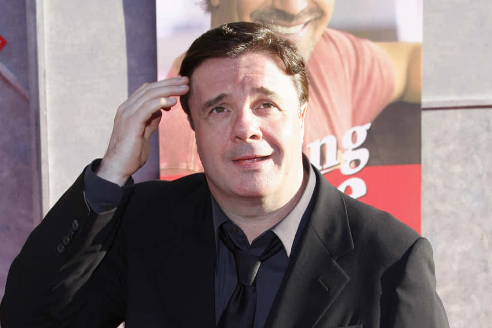 Nathan Lane In A Promotional Photo For The Broadway Revival Of The Odd Couple Background