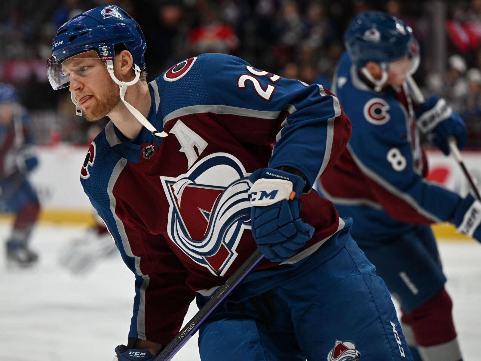 Nathan Mackinnon In Colorado Avalanche Uniform Background