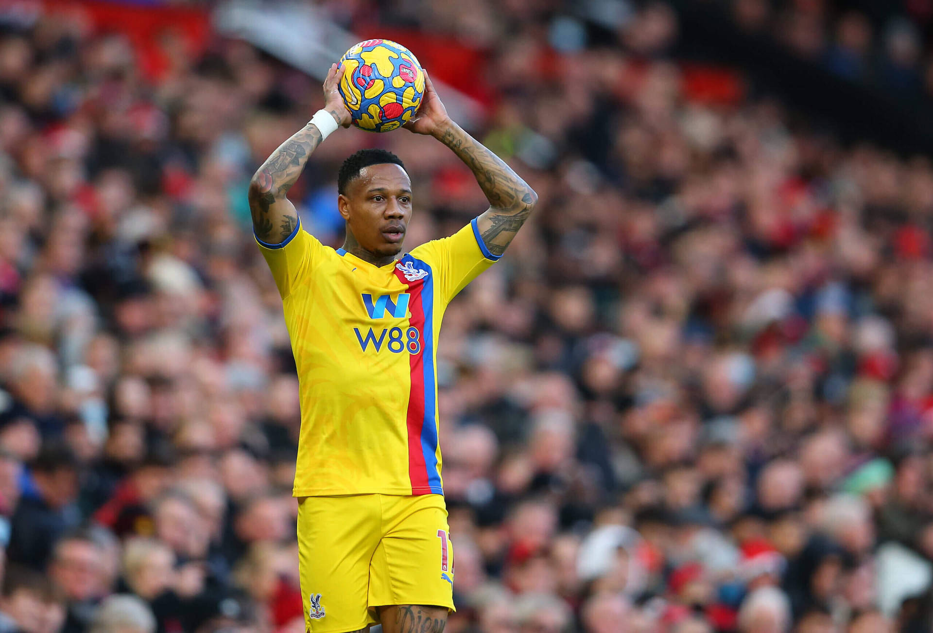 Nathaniel Clyne Holding Ball Over Head Background