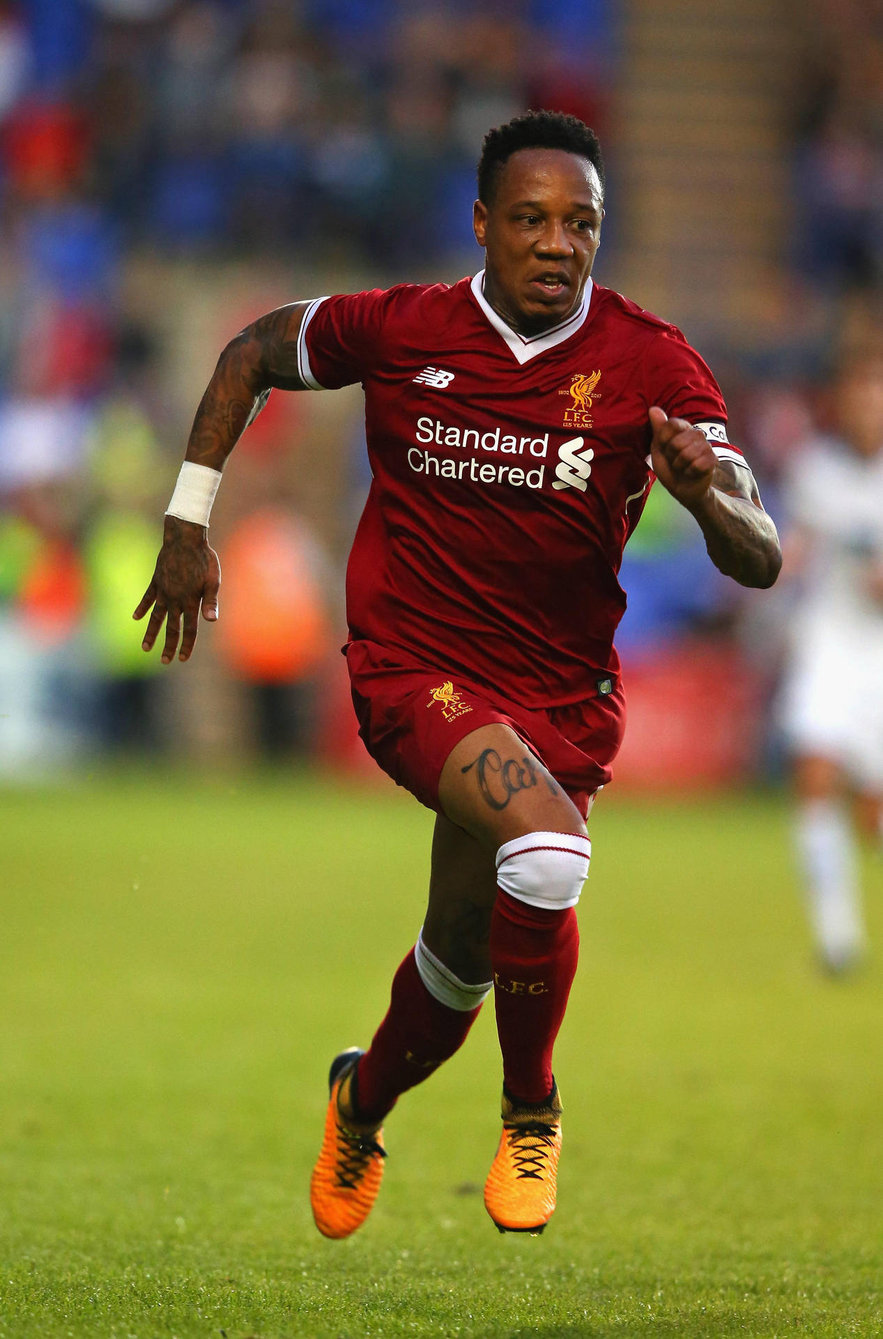 Nathaniel Clyne Running On The Field Background