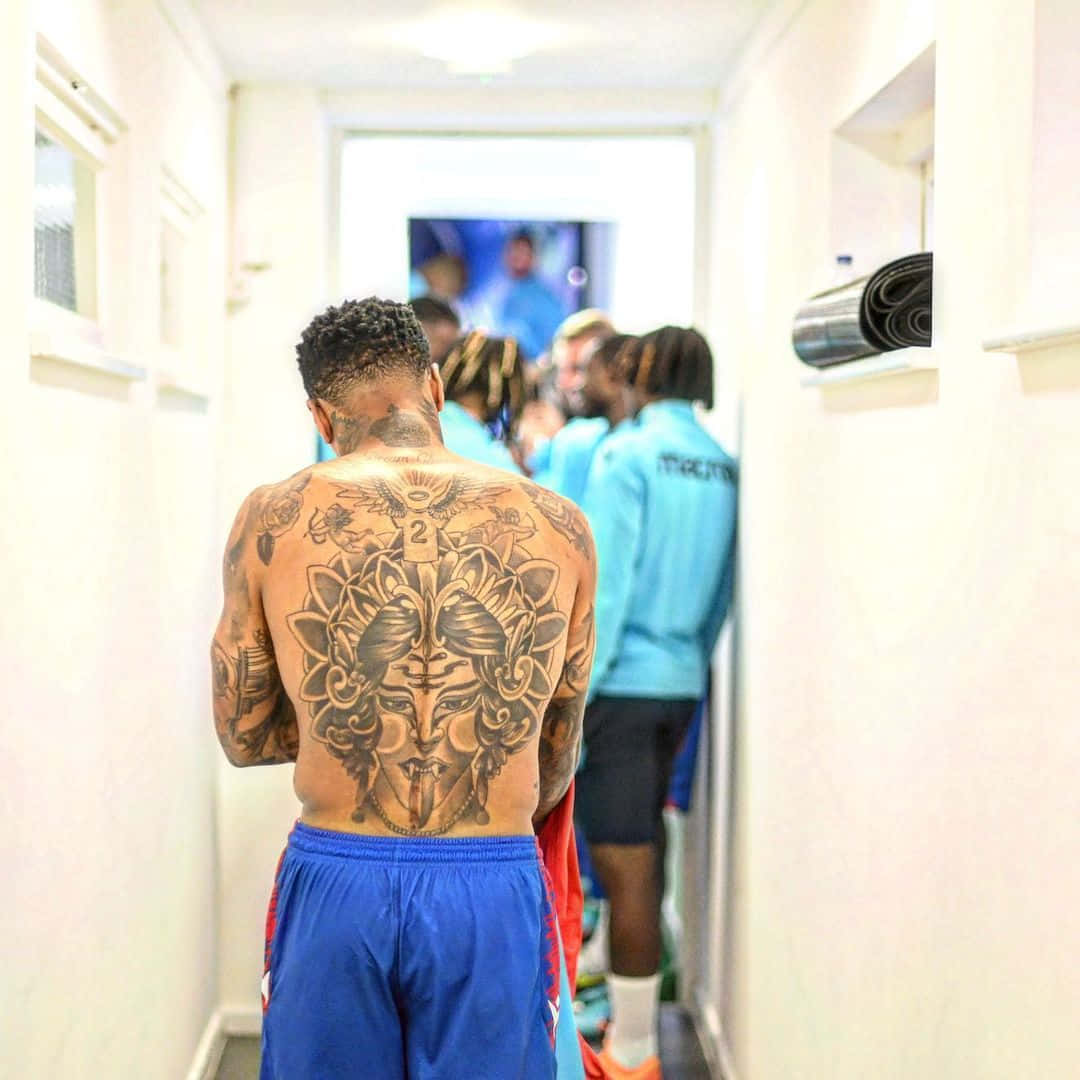 Nathaniel Clyne Showcasing His Back Tattoos