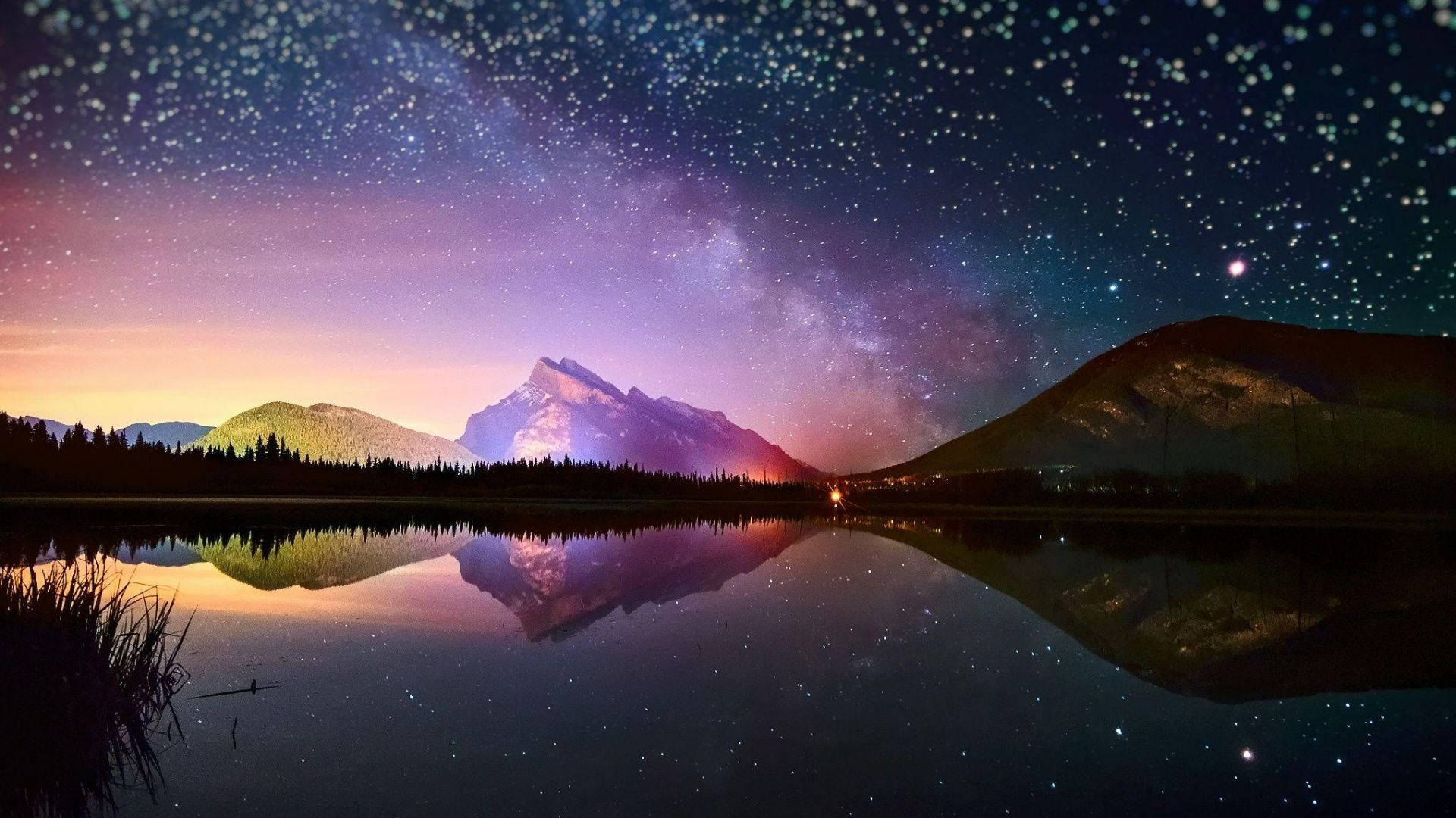Natural Lake And Mountains With Starry Sky Background