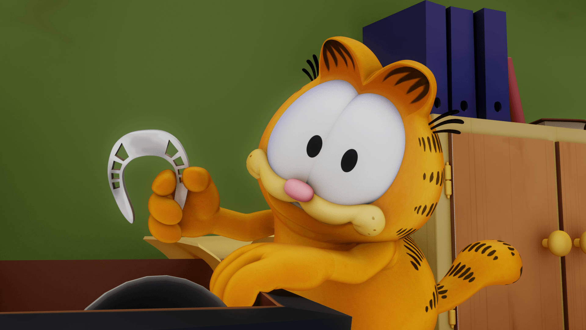 Naughty Garfield Cat Playing With Horseshoe Background