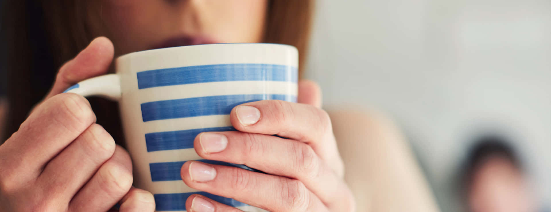 Nauseous Woman Holding Blue Mug Background