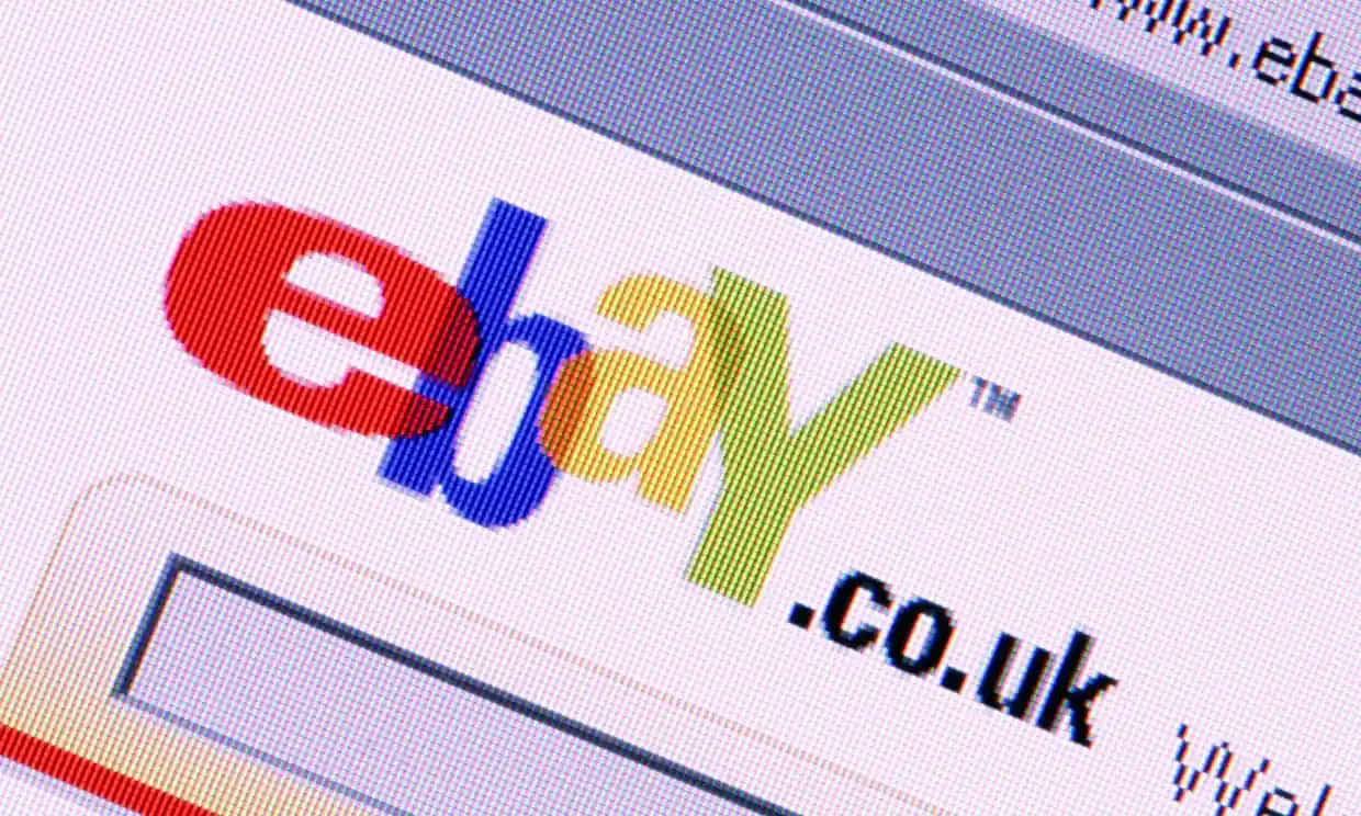 Navigating Ebay Uk Platform On A Tilted Screen Background