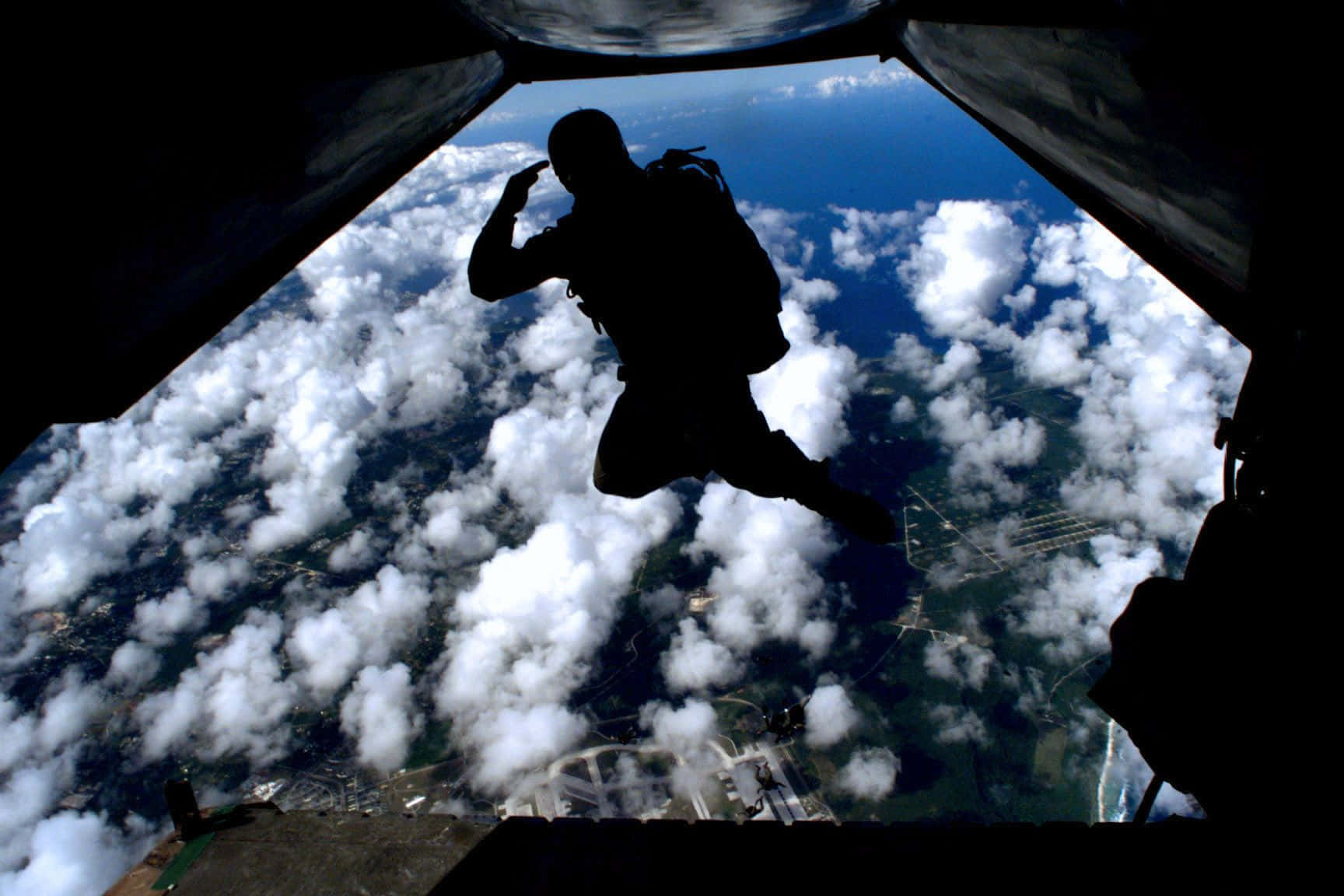 Navy Seals Setting Off On A Mission Background