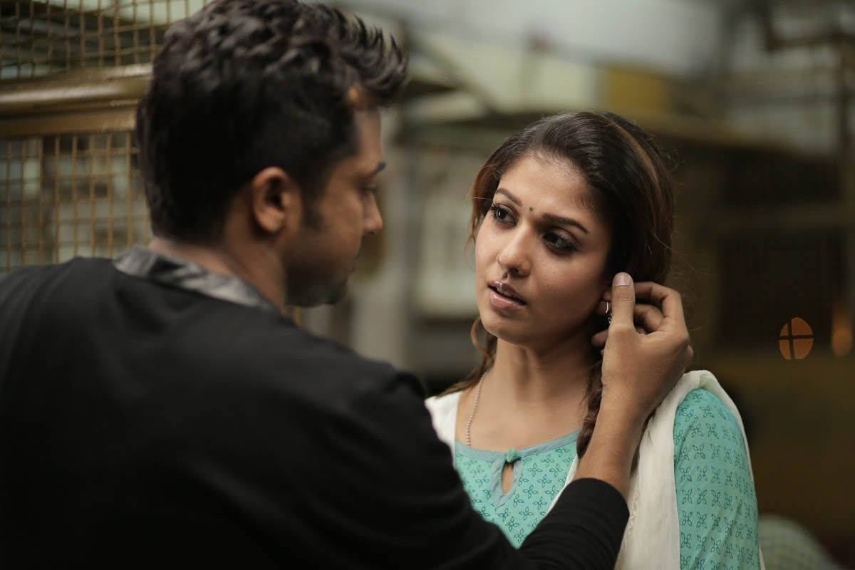 Nayanthara And Suriya Sharing A Moment In The Movie Masss Background