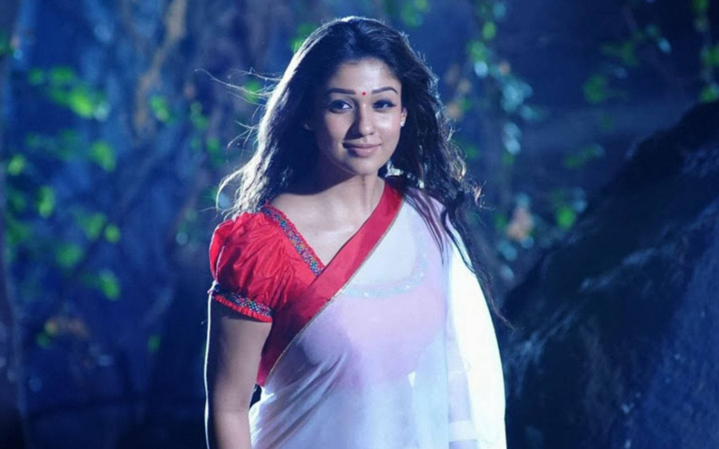 Nayanthara Exudes Elegance In A Pink And White Saree Background