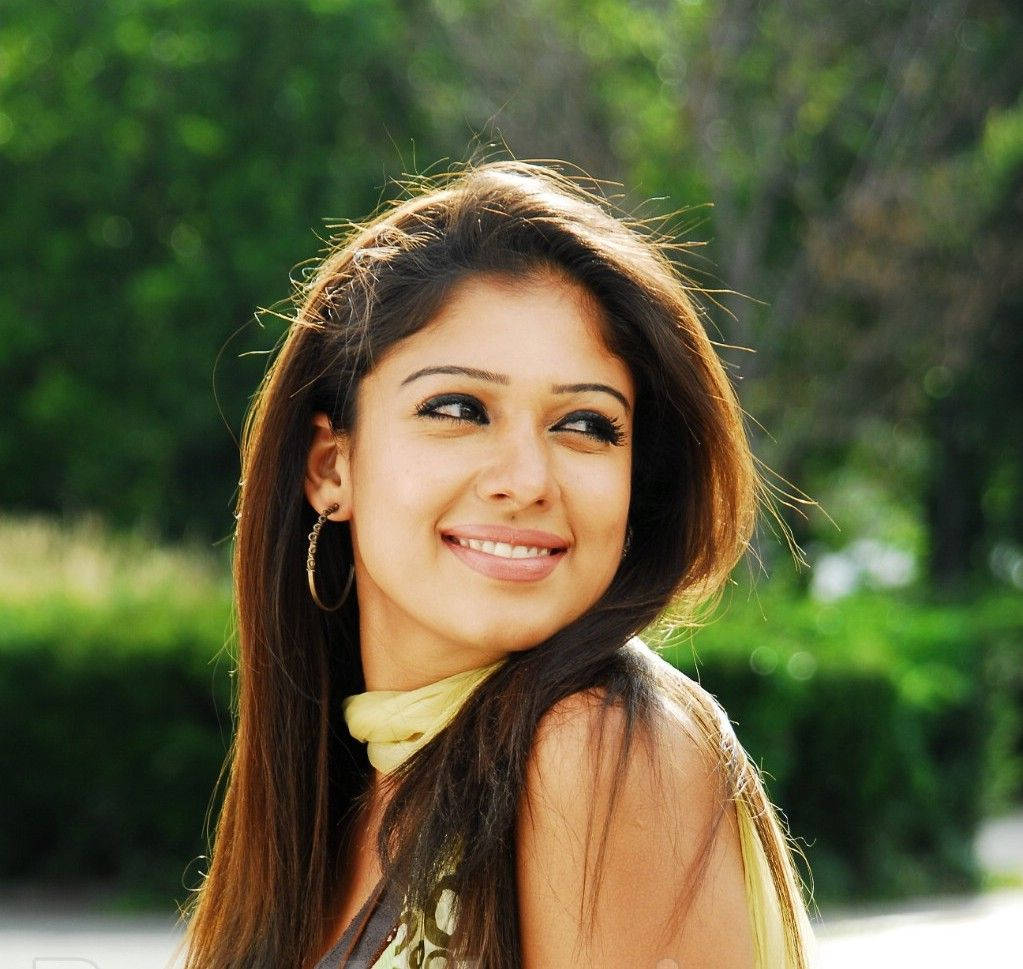 Nayanthara Looking Behind Forest Aesthetic Background