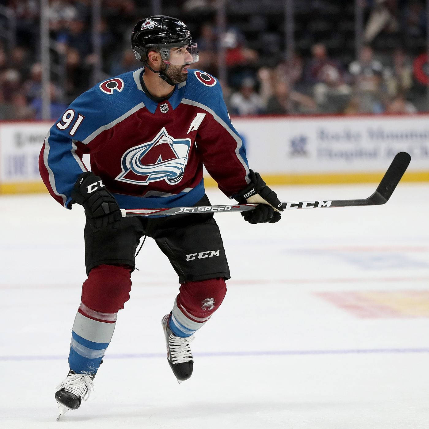 Nazem Kadri In Action For The Colorado Avalanche Background