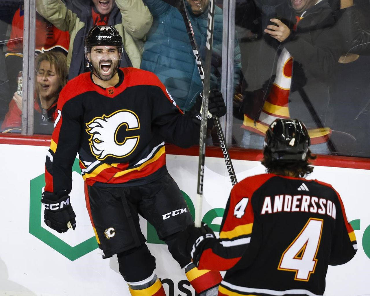 Nazem Kadri In Action With Rasmus Andersson Background