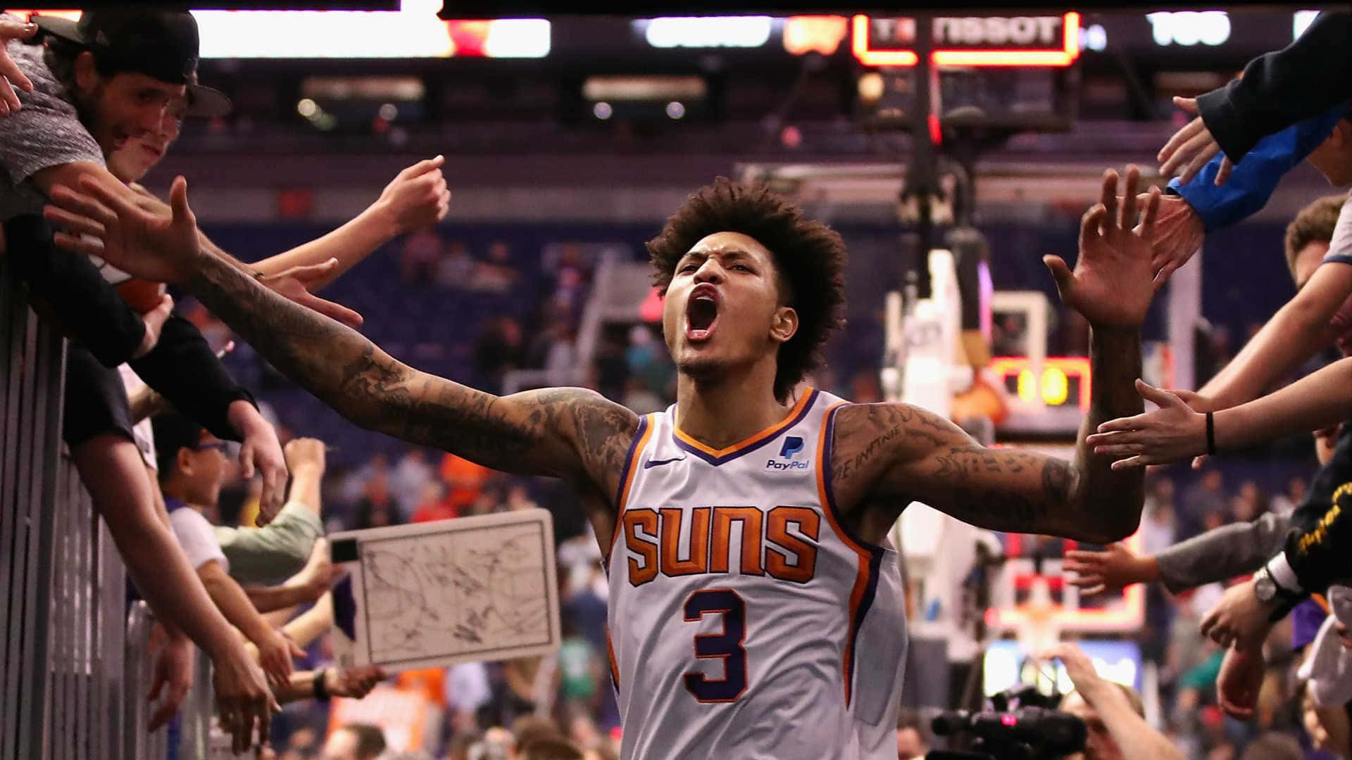 Nba All-star Kelly Oubre Jr. Getting Ready To Shoot A Three Pointer Background