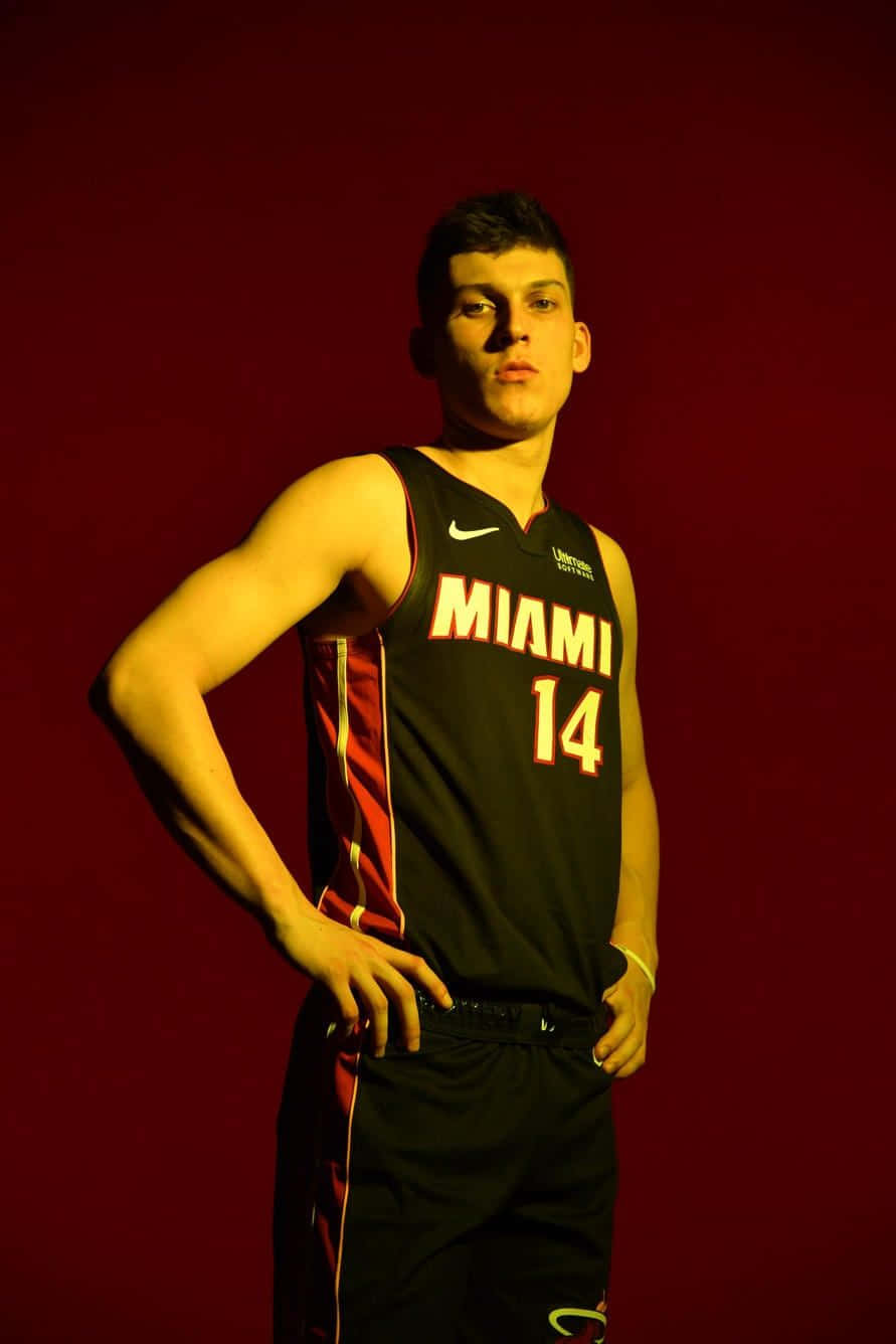 Nba Draft Pick And Miami Heat Star Tyler Herro In Action Background