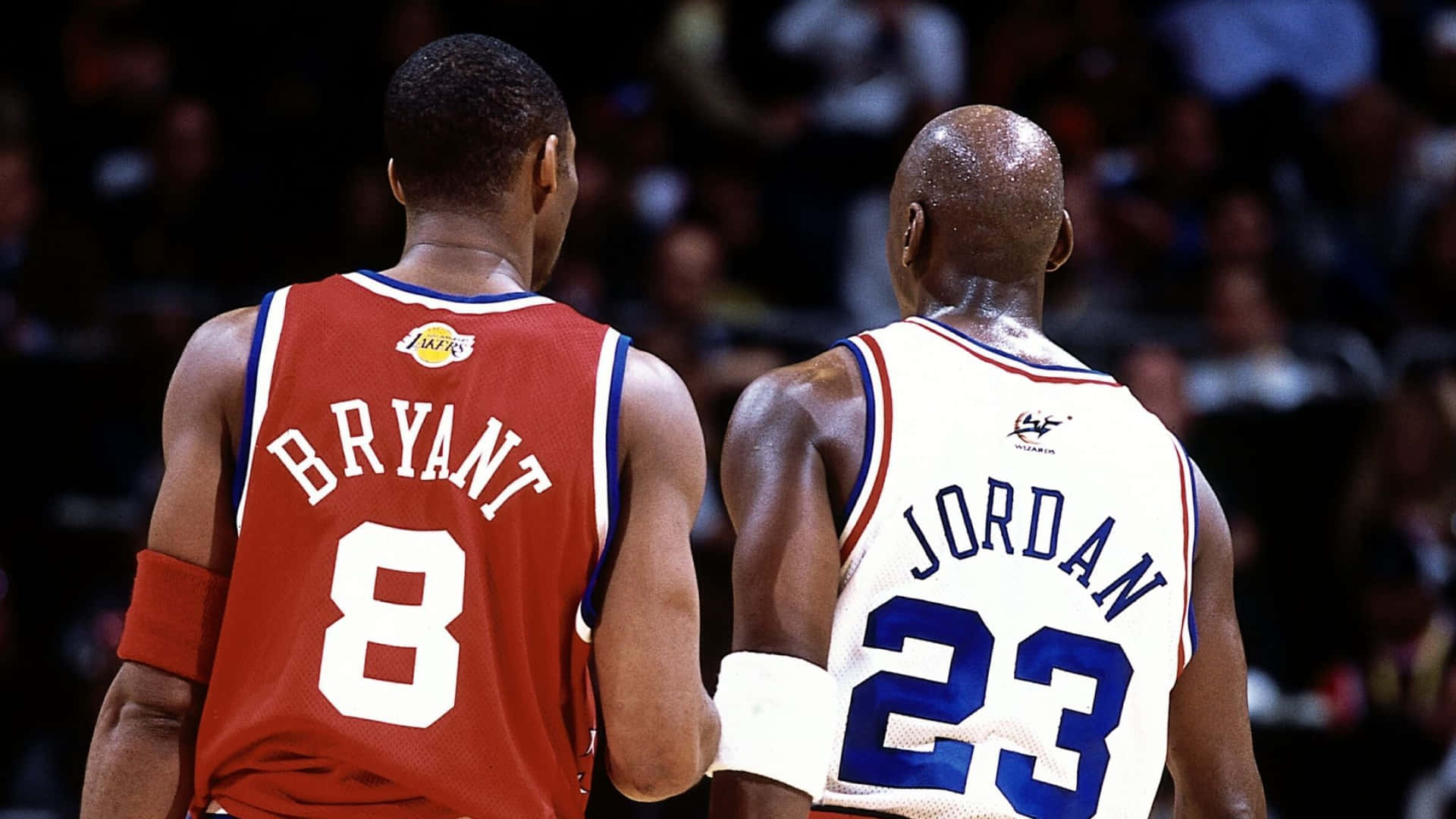 Nba Icons Kobe Bryant And Michael Jordan Back Angle Shot Background