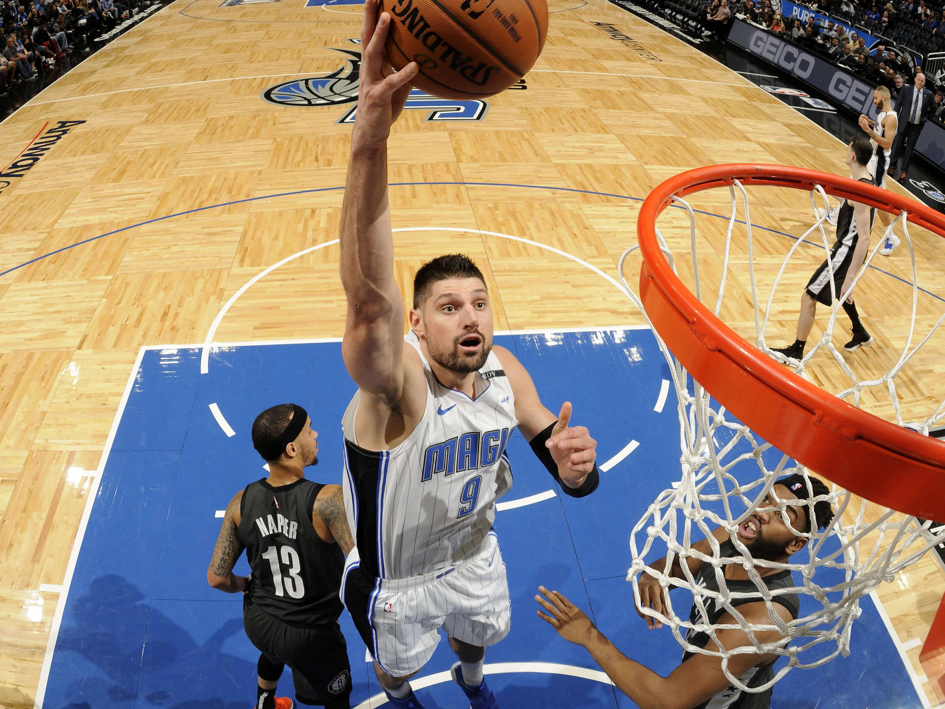 Nba Player Orlando Magic Nikola Vucevic Layup Background