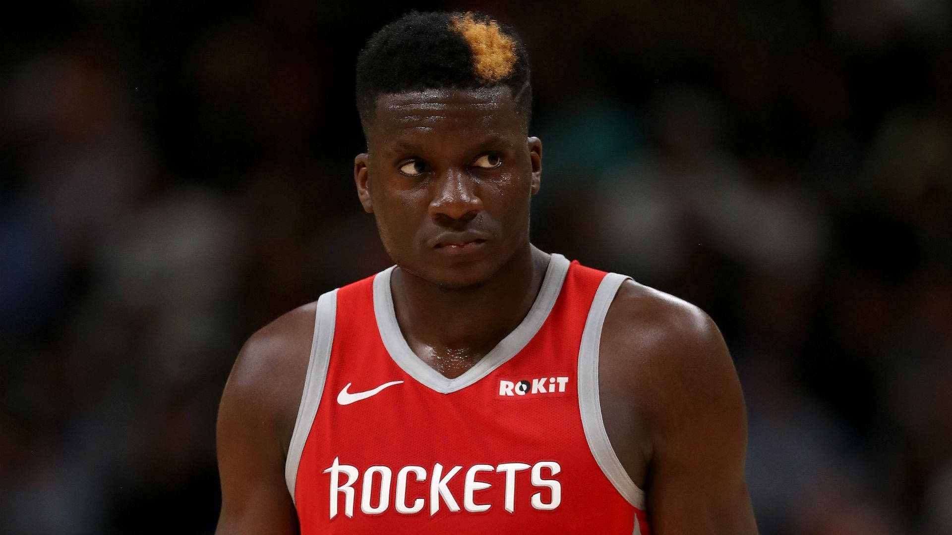 Nba Star Clint Capela Engaged In An Intense Game Background