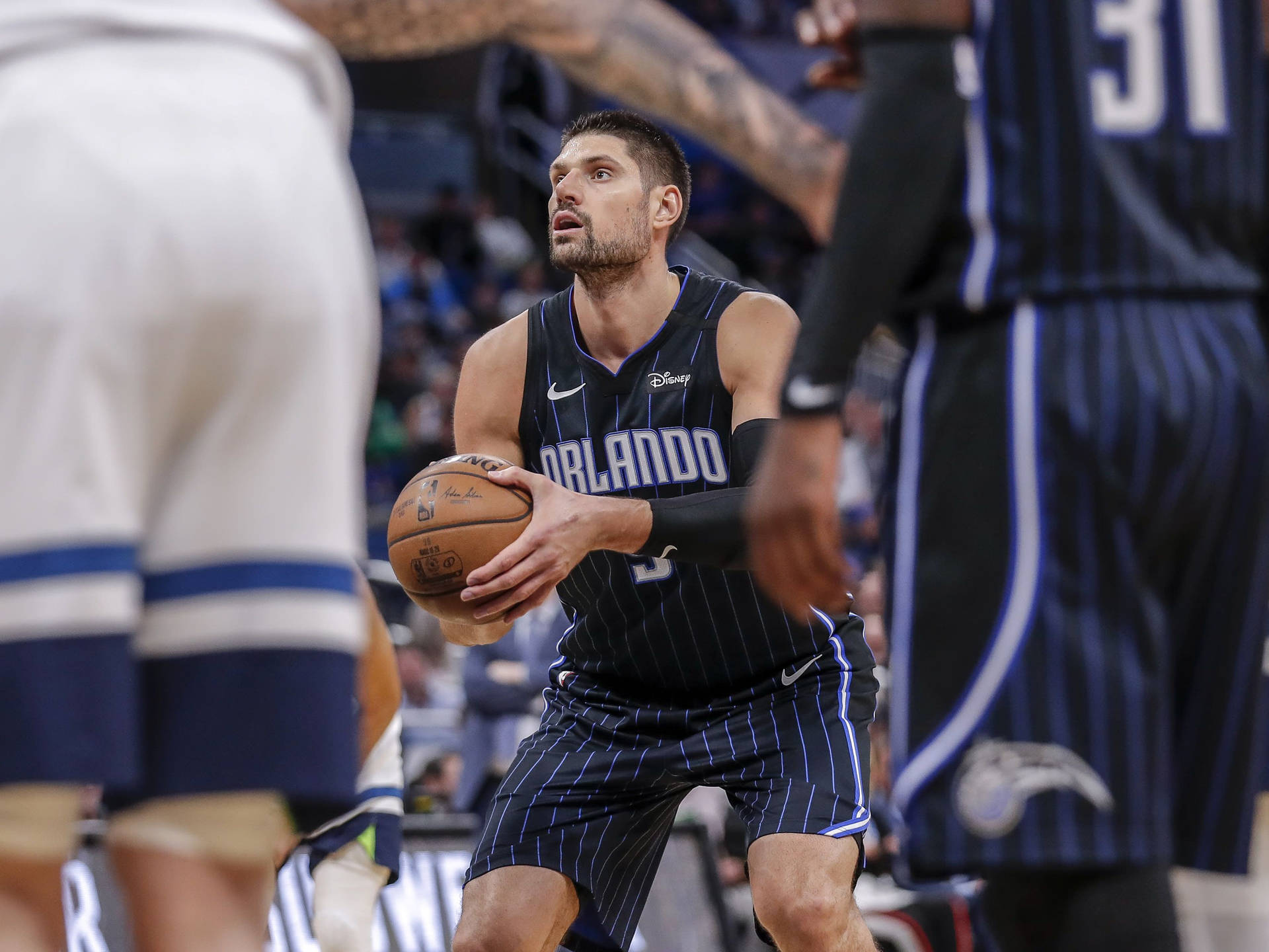 Nba Star Nikola Vucevic Takes A Free Throw