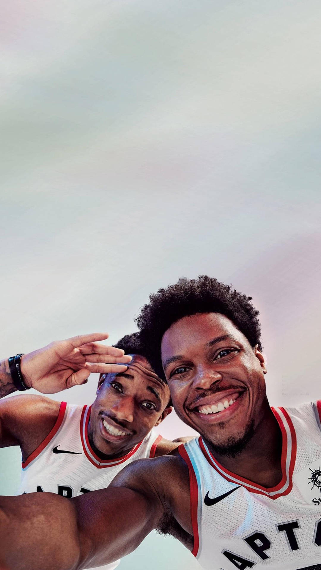 Nba Stars Kyle Lowry And Demar Derozan Sharing A Light Moment With A Selfie.