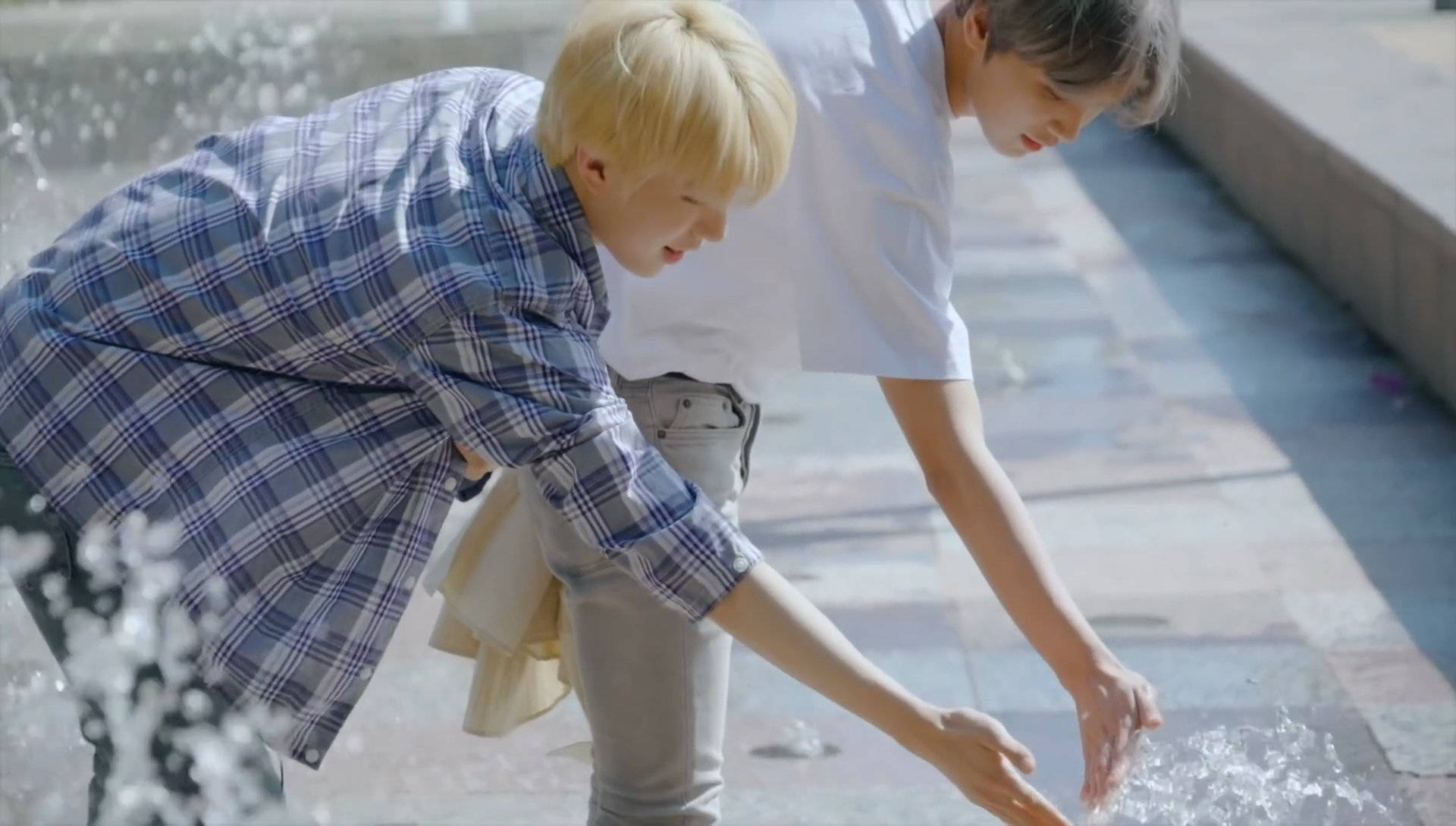 Nct 127 Jungwoo Haechan Playing With Water Background