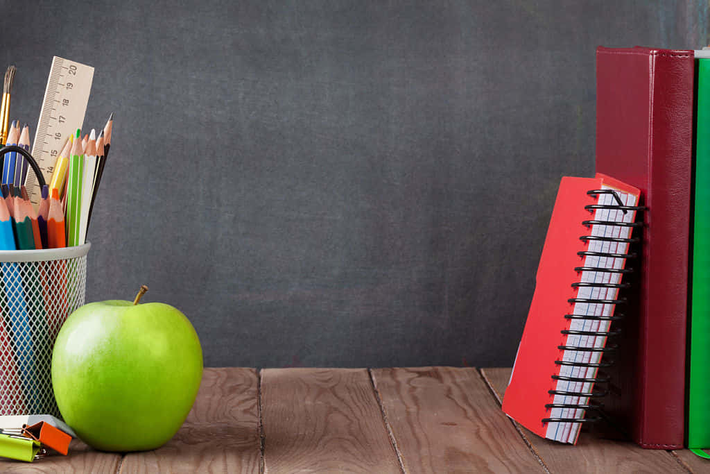 Neat Desk Of An Educated Teacher Background