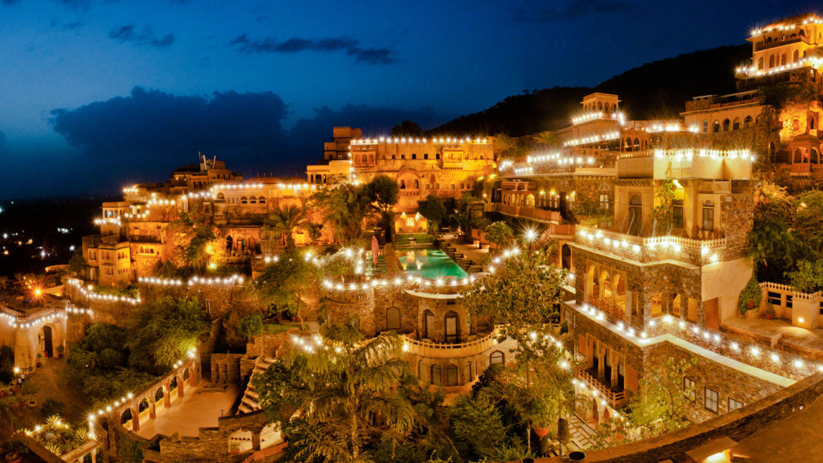 Neemrana Fort Palace At Night Background