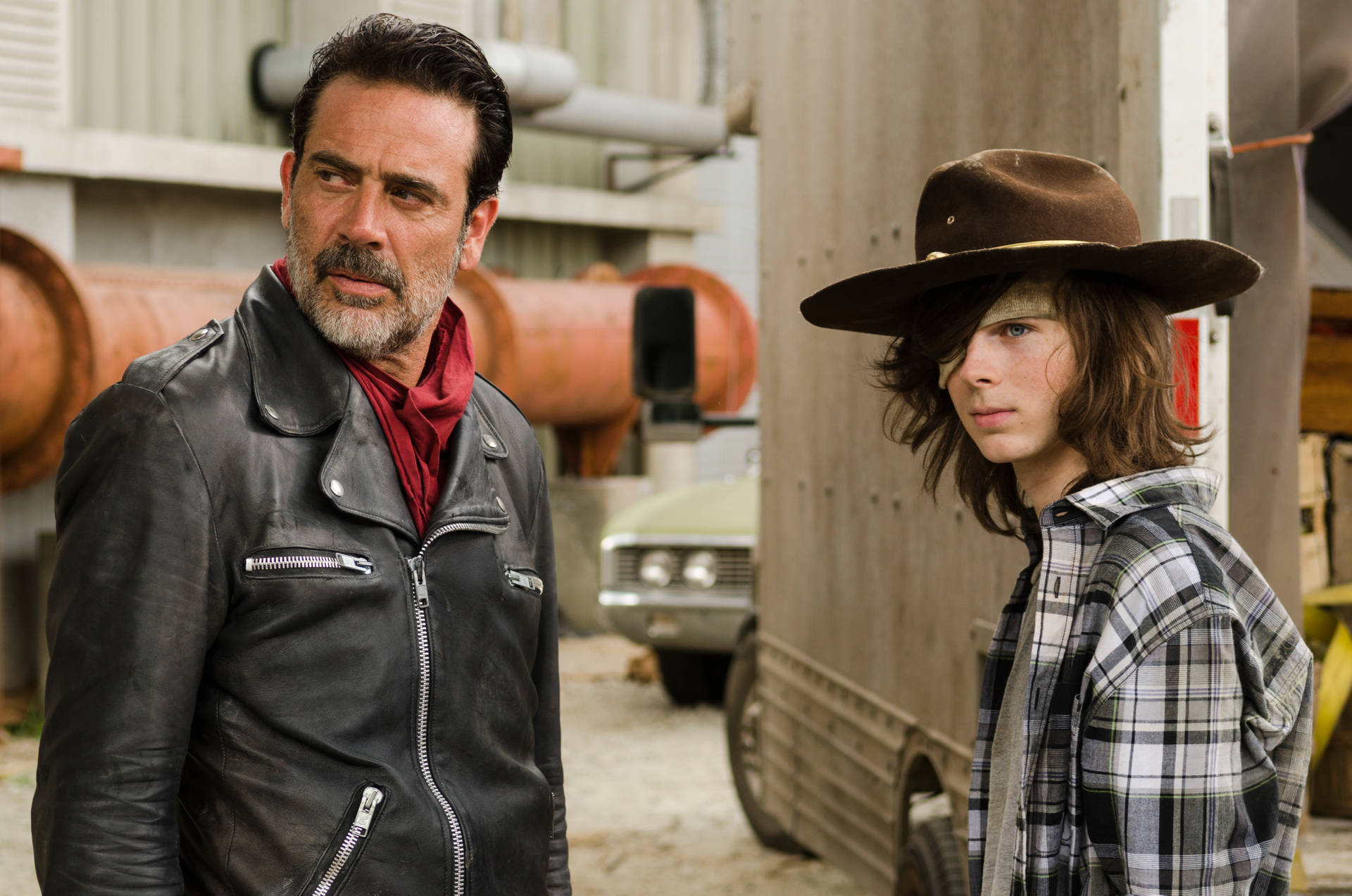 Negan And Carl Standing Together Background