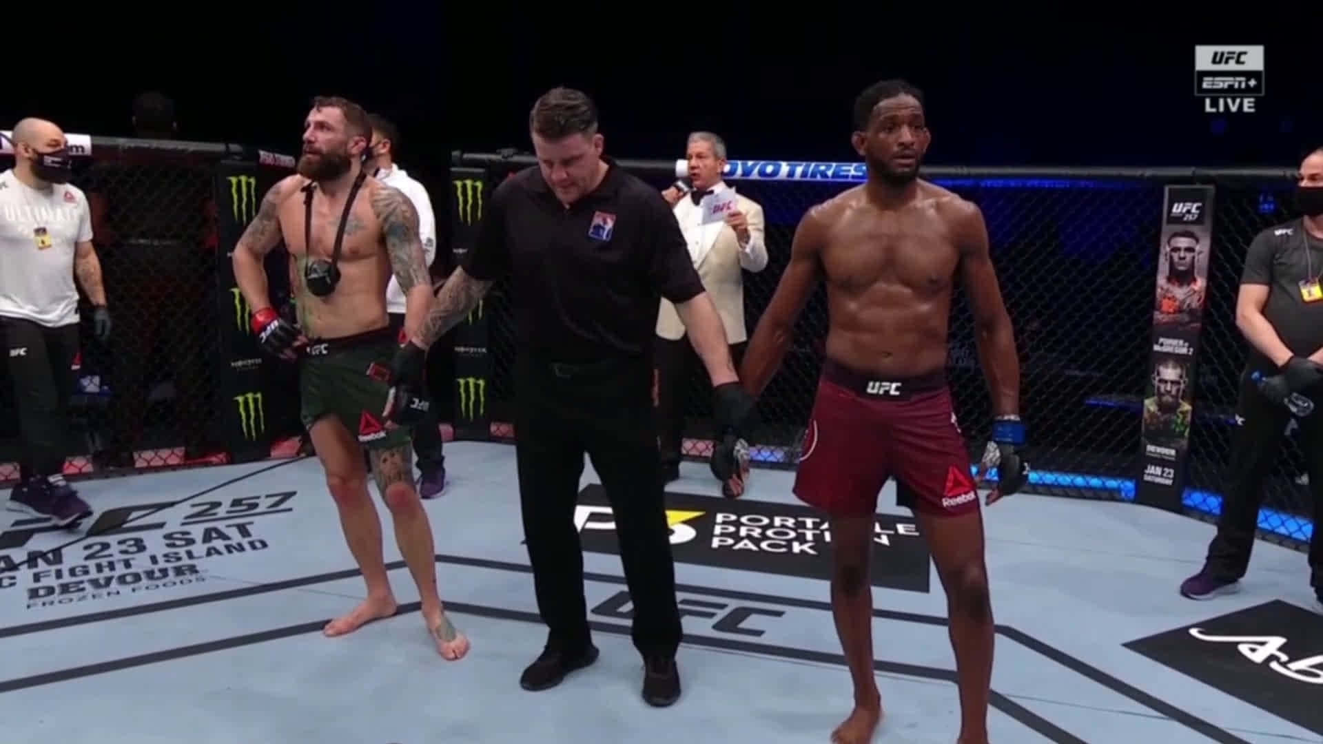 Neil Magny With Referee Background