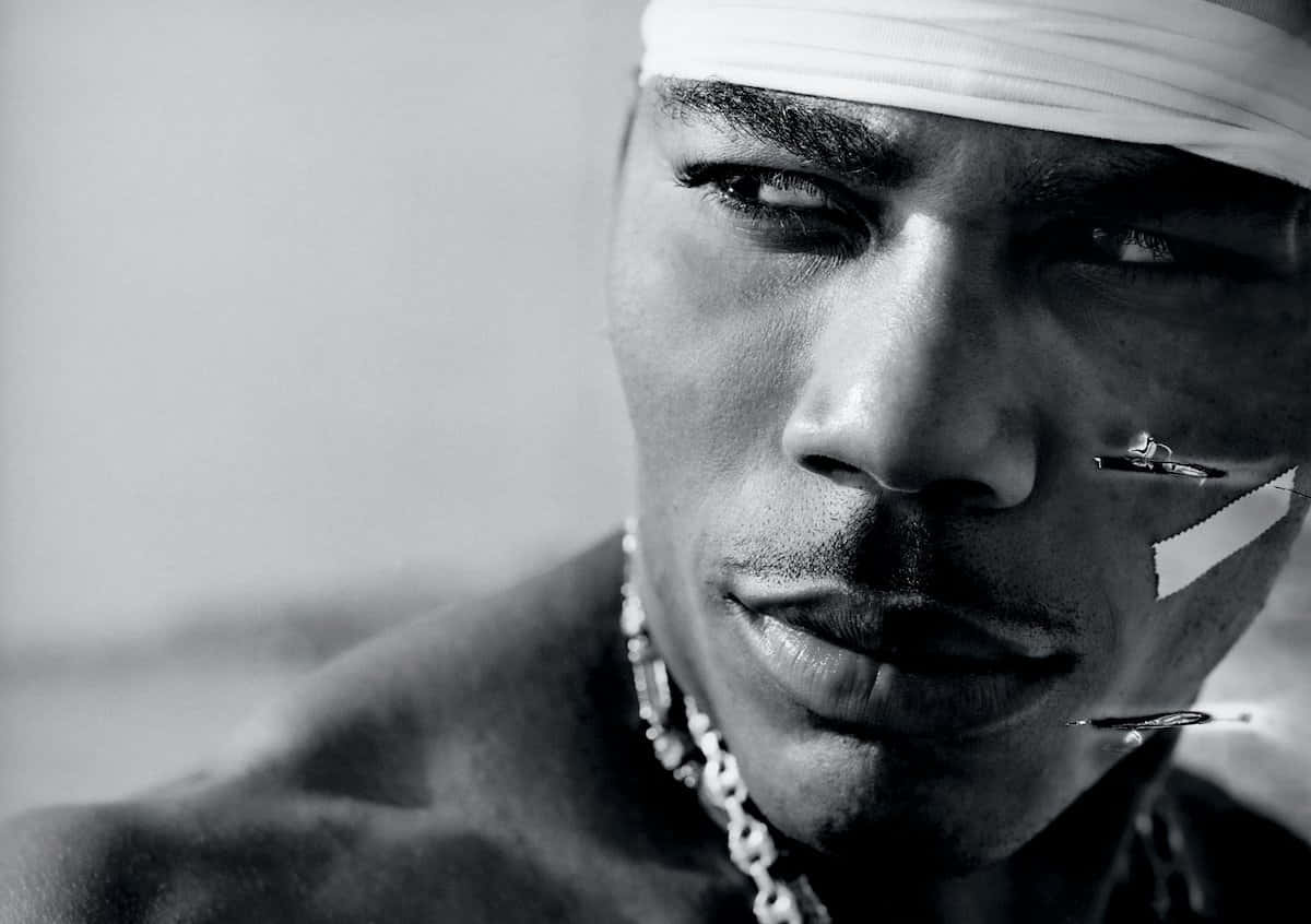 Nelly Thriving In The Spotlight Of His Career Background