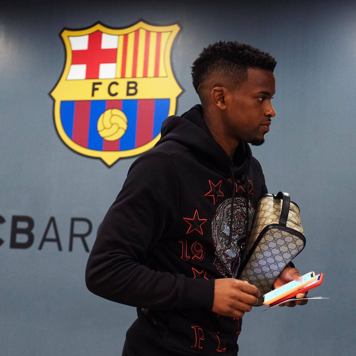 Nelson Semedo And Fc Barcelona Logo