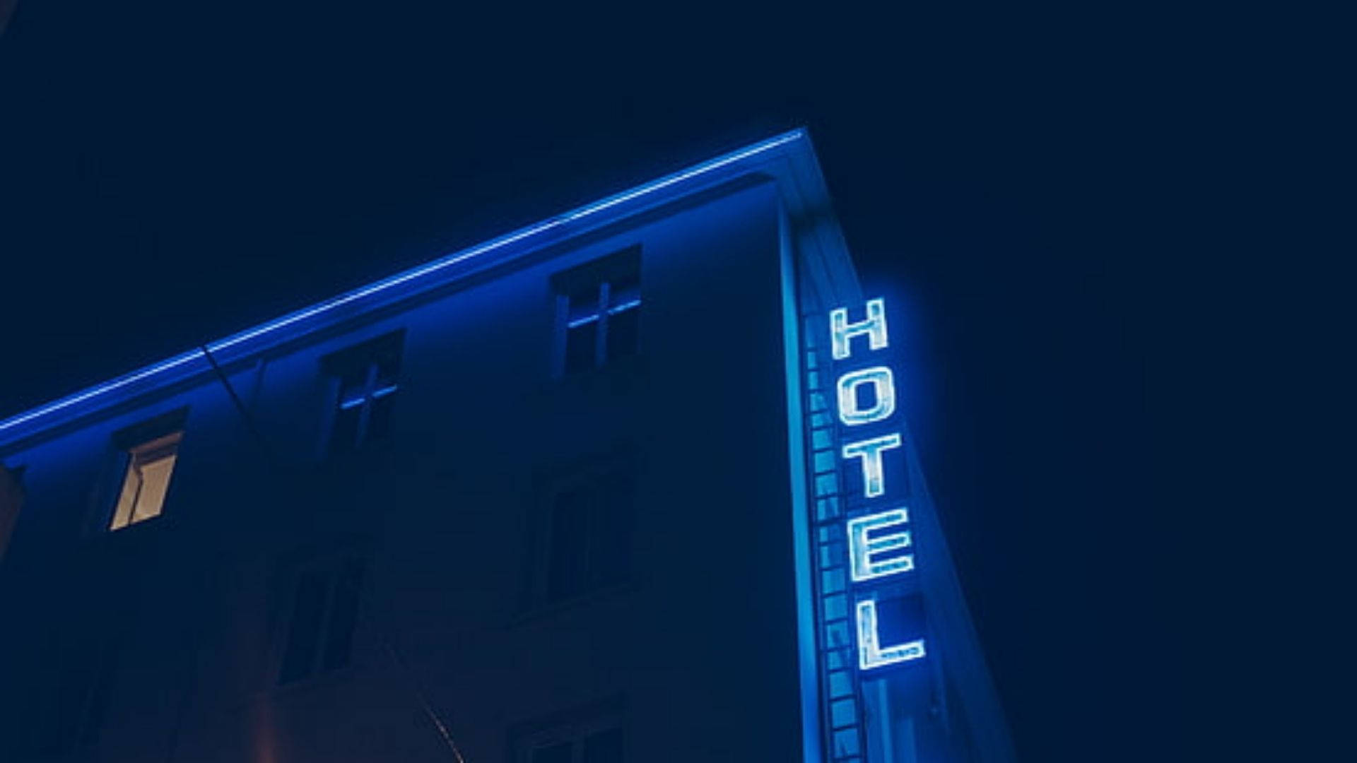 Neon Blue Hotel Signage Background
