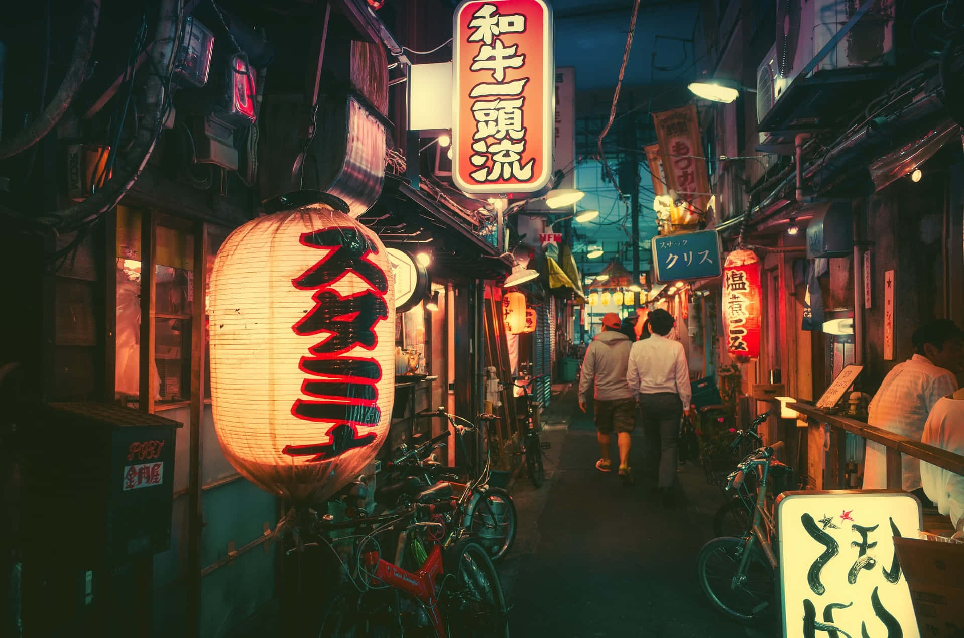 Neon Lights Illuminate The Streets Of Japan Background