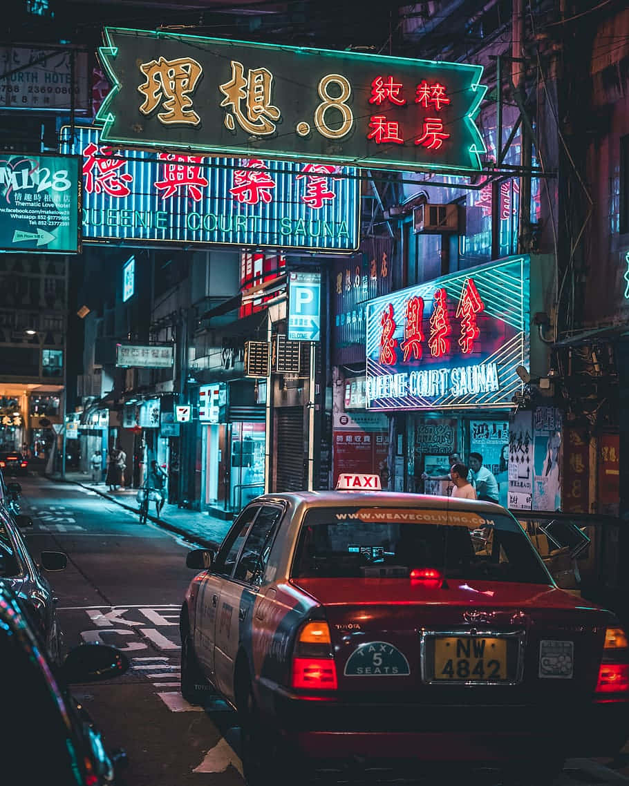 Neon Lit Urban Street At Night