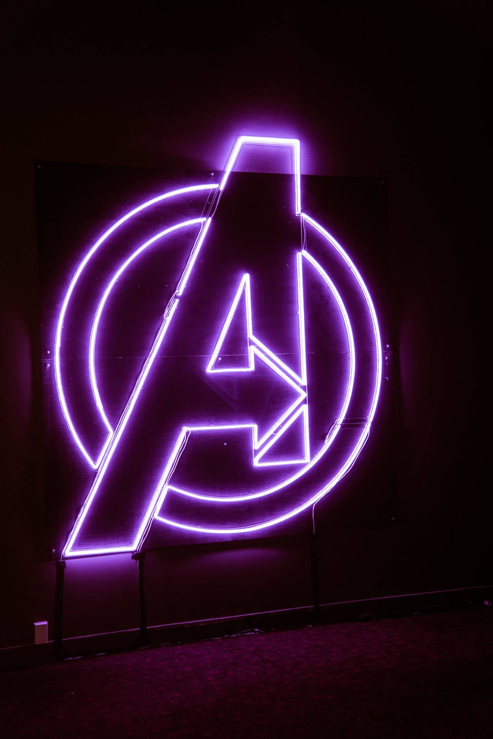 Neon Purple Avengers Logo Background