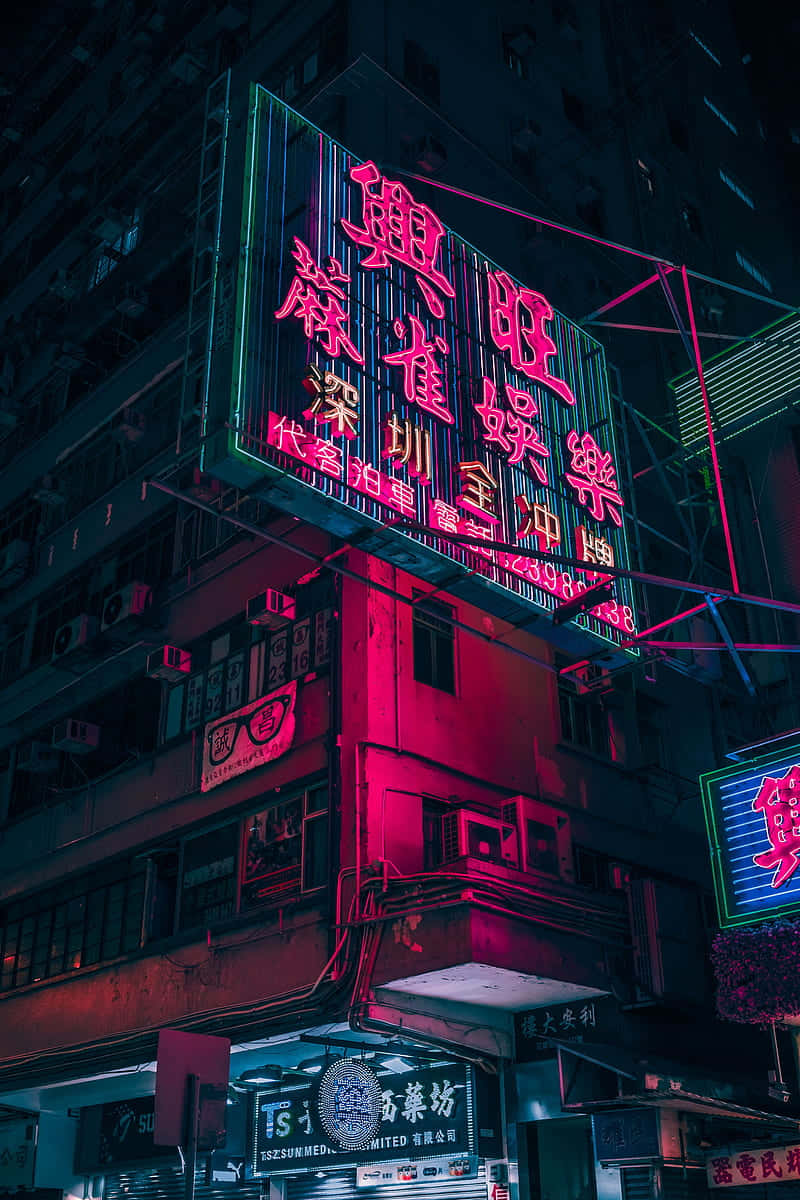 Neon Sign On A Building Background