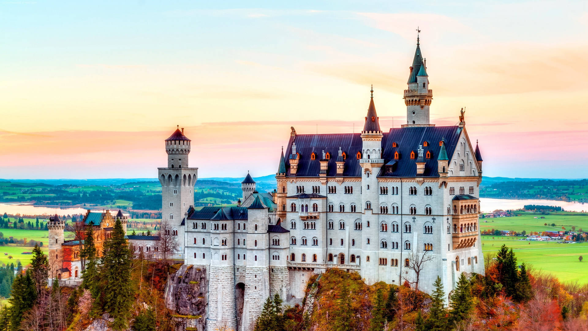 Neuschwanstein Castle Colorful Sunset Background