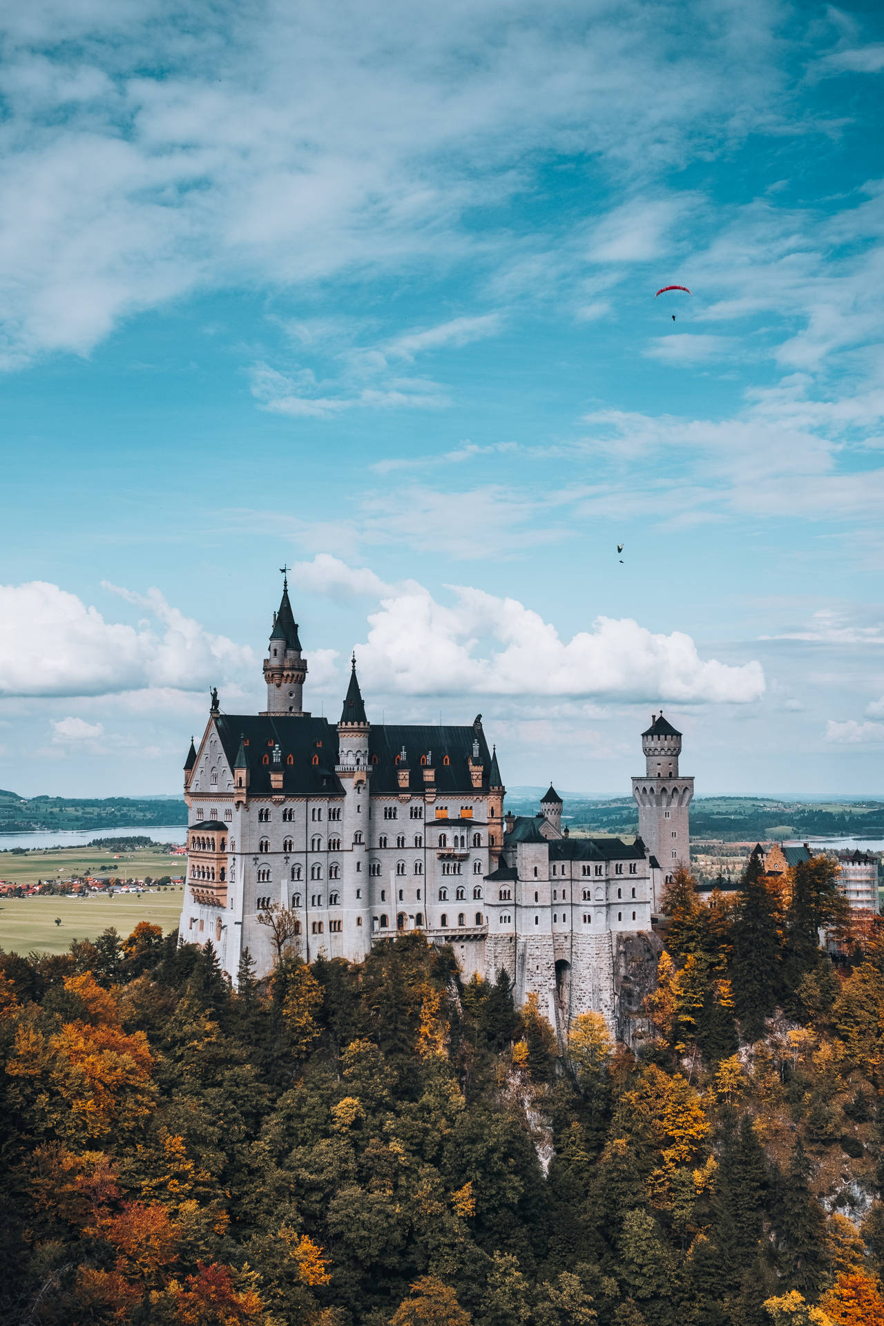 Neuschwanstein Castle Orange And Green Leaves Background