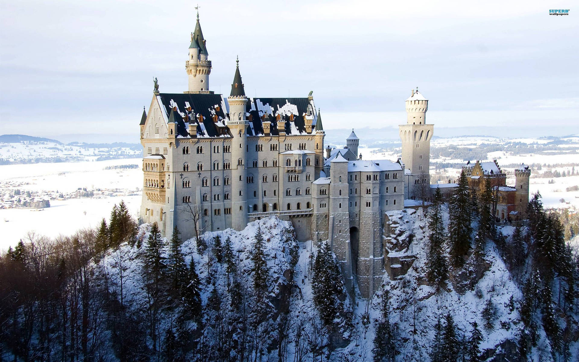 Neuschwanstein Castle Roof Covered In Snow Background