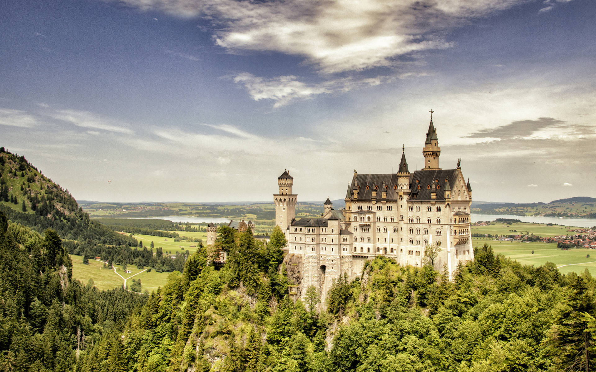 Neuschwanstein Castle White Clouds In Afternoon Background