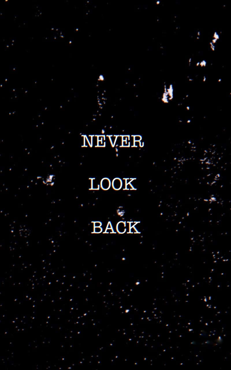 Never Look Back - A Black And White Image Background