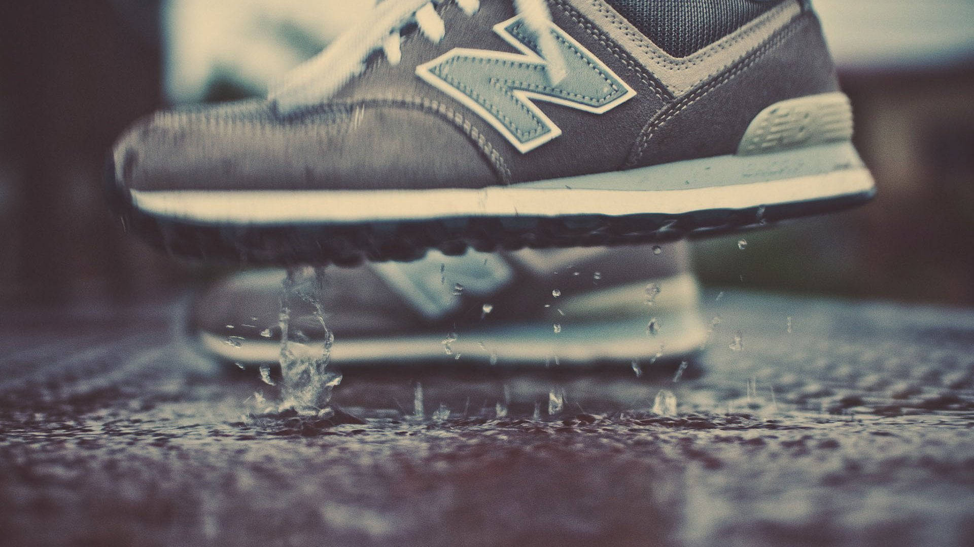 New Balance On Puddle Of Water Background